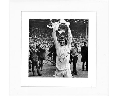 Football Allan Clarke 12x12 mounted signed b/w photo pictured holding the FA cup while playing for Leeds United. Allan John C