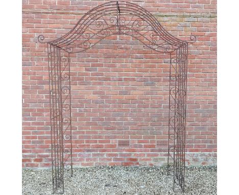 A wrought iron rose arch With an ogee shaped top.207cm wide x 61cm deep x 266cm highQty: 1In reasonable weathered condition.