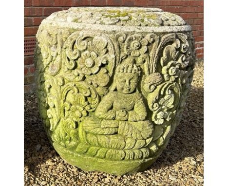 A Thai carved stone heavy ovoid planter Decorated with a figure of Buddha amongst scrolling foliate ornament.70cm diameter x 