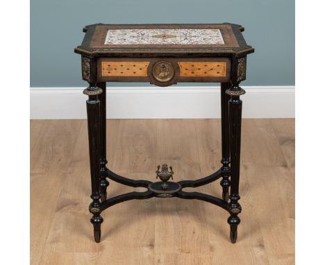 A late 19th century Aesthetic Movement dressing table With an Italian Majolica inset tile to the top and an inlaid geometric 