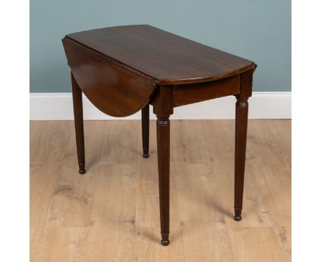 A Louis XVI/Directoire, late-17th century mahogany drop-leaf table The circular top raised on turned legs.48cm (90cm unfolded