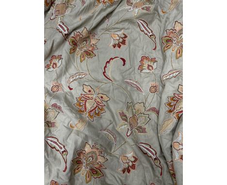 A pair of large crewel work interlined curtains With scrolling foliate ornament and with triple-pleated tops. Each curtain ap