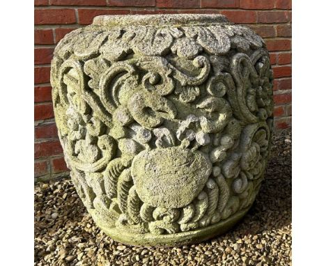 A Thai carved stone ovoid planter Decorated with signs of the Zodiac amongst scrolling foliate ornament.66cm diameter x 75cm 