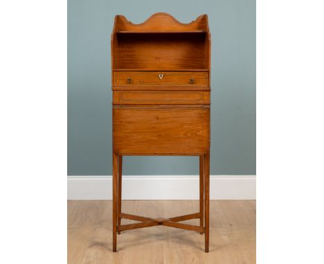 A 19th century Sheraton-style satinwood book stand  The shaped gallery with a shelf over a single drawer above a drop-leaf, a