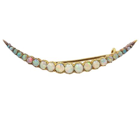 Early 20th century 18ct gold graduating opal crescent broochCondition Report:Approx 3.67gm, length 50mm, brooch tests 18ct, b