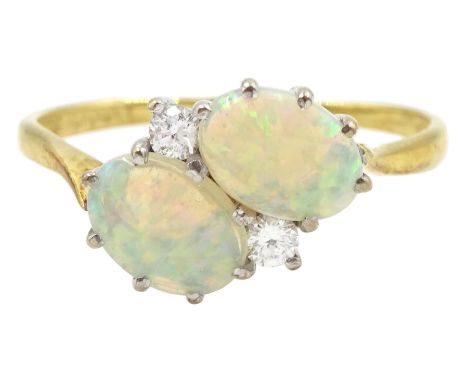 18ct gold two stone oval opal and two stone round brilliant cut diamond crossover ring, London 1981Condition Report:Approx 2.