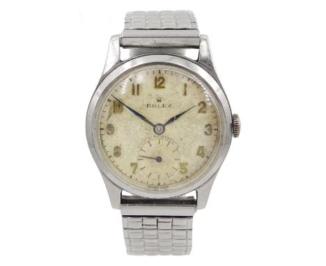 Rolex stainless steel manual wind shock resisting wristwatch, cream dial with subsidiary seconds dial, back case by Dennison 
