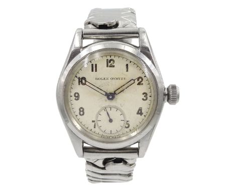 Rolex Oyster stainless steel manual wind wristwatch, circa 1941, Ref. 3121, serial No. 116047, on expanding stainless steel s
