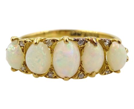 18ct gold graduating five stone opal ring, with diamond accents set between, hallmarkedCondition Report:Approx 3.8gm, size N-