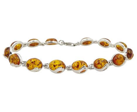 Silver Baltic amber oval link bracelet, stamped 925Condition Report:Length = 20cm, good condition 