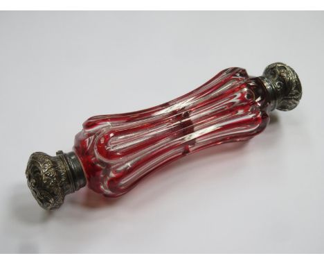 Victorian ruby red overlaid cut glass double ended scent bottle, with ornately repousse decorated caps (one hinged) and singl