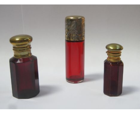 Victorian ruby glass cylindrical scent / perfume bottle, with hallmarked silver gilt screw cap, engraved with birds and folia