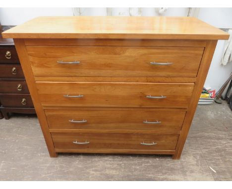 Modern solid light oak four drawer bedroom chest. Approx. 99cms long x 43cms deep x 89cms high 