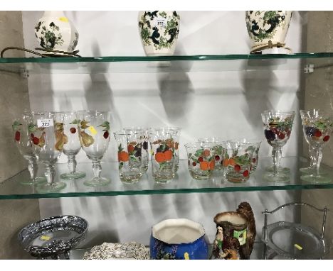 1 SHELF OF GLASS WITH FRUIT ON