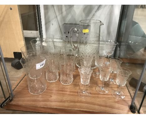 SHELF OF GLASSES & WATER JUG