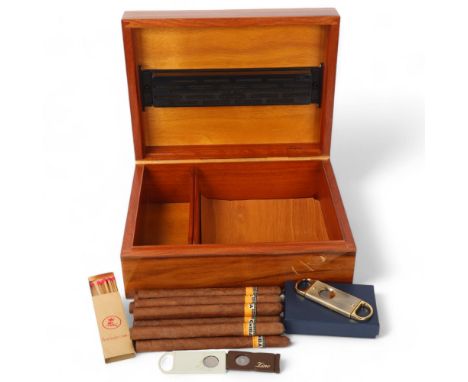 Zino coromandel humidor, 30.5cm x 23cm, height 12cm, containing 10 Cohiba cuban cigars and 3 cigar cuttersHumidor is in very 