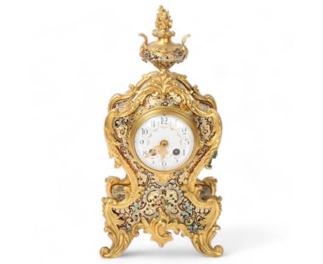 A French gilt-bronze and champleve enamel Rococo style clock, painted enamel dial, 8-day movement striking on a bell, overall
