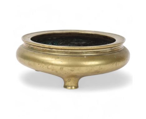 A Chinese polished bronze incense burner on 3 feet, impressed 6 character mark, rim diameter 14cm, height 5.5cm, 1.4kgNo dama