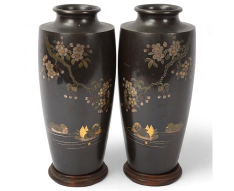 A pair of Japanese inlaid and patinated bronze vases, decorated with ducks and blossom trees, height 25.5cm