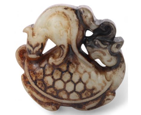 A Chinese relief carved jade turtle design pendant, length 5cm