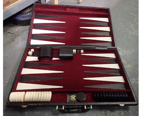 Cased large Backgammon set, appears unused when opened, 65 x 55 cm. P&amp;P Group 3 (£25+VAT for the first lot and £5+VAT for