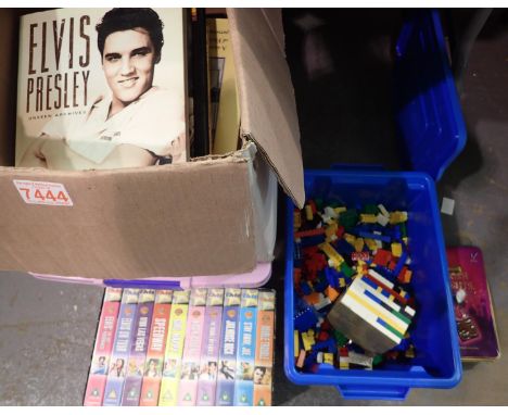 Two boxes of DVDs, CDs and books relating to Elvis Presley. Not available for in-house P&P 