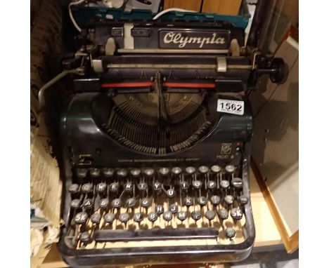 Vintage mechanical typewriter by Olympia. Not available for in-house P&amp;P 