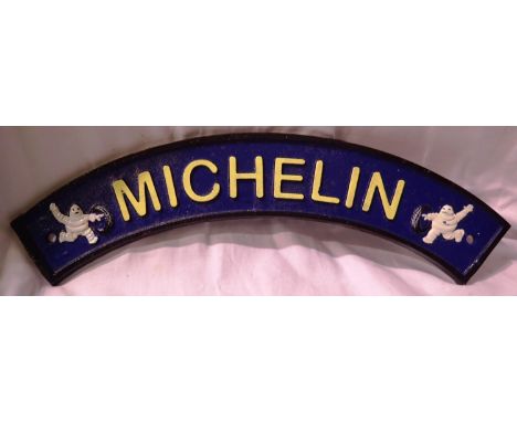 Cast iron curved Michelin sign, W: 30 cm. P&amp;P Group 1 (£14+VAT for the first lot and £1+VAT for subsequent lots) 
