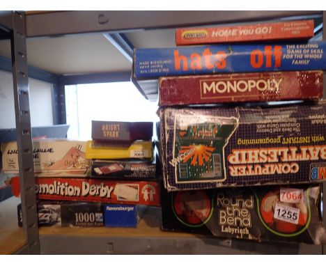 Shelf of mixed games to include Monopoly. Not available for in-house P&amp;P 