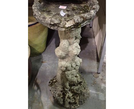 Reconstituted stone tree trunk form bird bath, H: 80 cm. Not available for in-house P&amp;P 