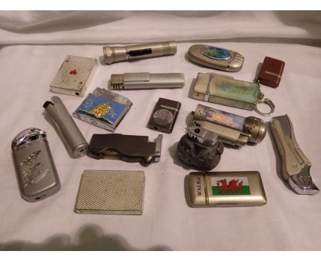 Quantity of mixed lighters including novelty examples. P&amp;P Group 1 (£14+VAT for the first lot and £1+VAT for subsequent l