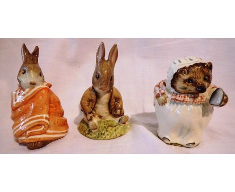 Three Beatrix Potter figurines by Royal Albert and Beswick, largest H: 10 cm. P&amp;P Group 3 (£25+VAT for the first lot and 