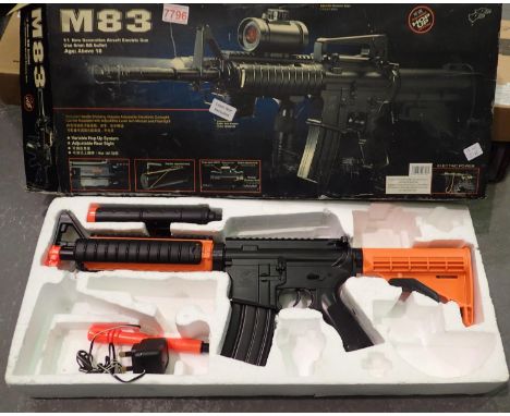 M4 style AEG with magazines and accessories, working at lotting. P&amp;P Group 3 (£25+VAT for the first lot and £5+VAT for su