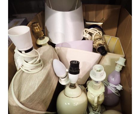Nine lamps to include ceramic examples, with a quantity of assorted shades. Not available for in-house P&amp;P 