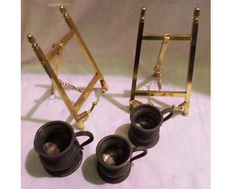 Pair of small brass A frames, each H: 16 cm, and three miniature pewter measures. P&amp;P Group 2 (£18+VAT for the first lot 