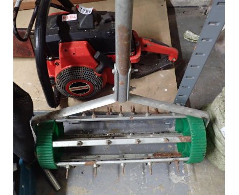 Manual lawn aerator. Not available for in-house P&amp;P 