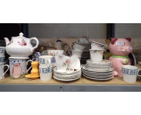 Shelf of mixed ceramics including Percy pig biscuit barrel. Not available for in-house P&amp;P 