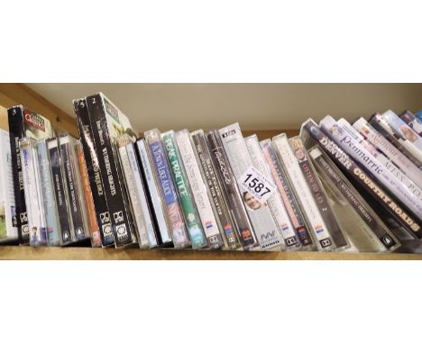 Shelf of mixed DVDs and audio books cassettes and CDs. P&amp;P Group 3 (£25+VAT for the first lot and £5+VAT for subsequent l