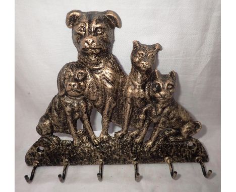 Bronzed dog tail coat hook, L: 23 cm. P&P Group 1 (£14+VAT for the first lot and £1+VAT for subsequent lots) 
