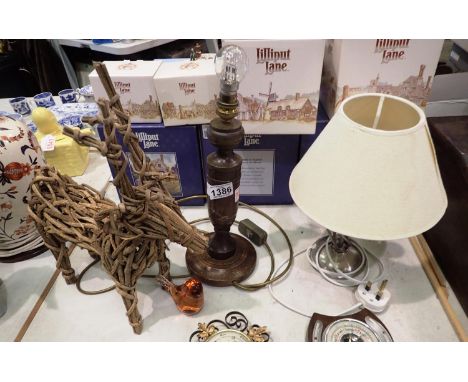 Turned oak lamp, further lamp, two barometers, Wedgwood paperweight, and a reindeer. All electrical items in this lot have be