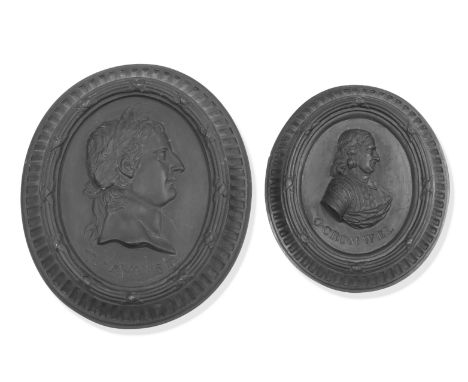 Two 19th century black basalt oval portrait plaquesdepicting Tiberius Augustus and Oliver Cromwell in raised relief,  19.5 hi
