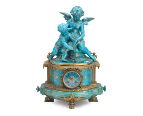 A late 19th century French ceramic and gilt metal mounted mantel clockThe 3 inch dial with Roman numerals, the twin train mov