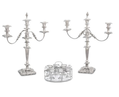 A pair of electroplated three-light candelabra and an egg epergneunmarked The candelabra with twin scrolling arms and foliate