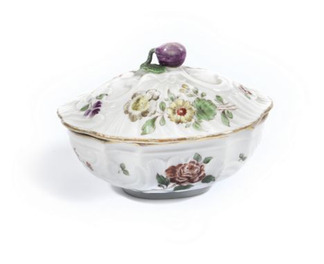 A small Cozzi box and coverCirca 1760Of oval form with moulded shell and rocaille detail, painted with colourful flower spray