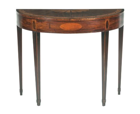 A George III mahogany and satinwood inlaid card tableThe semi-circular fold over top with radiating veneers, enclosing a gree