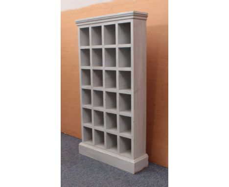 A modern grey-painted pine shelf unit - with twenty-four pigeonholes, originally designed and used as bespoke storage for lad