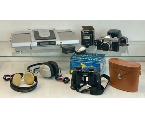 A small collection of vintage cameras, headphones and a CD/DAB radio - comprising a Praktica Super TL 1000 35mm SLR film came