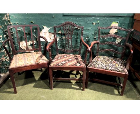 Three 18th century mahogany elbow chairs - two in the Chippendale ladderback style, one Hepplewhite style, all with later uph