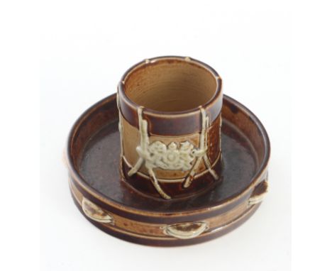 A Doulton Lambeth stoneware match holder and striker c.1900 in the form of a drum and tambourine  