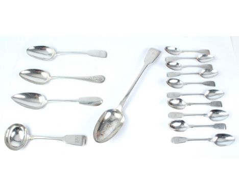 A small group of 19th century silver fiddle pattern flatware - comprising a William IV basting spoon, William Collins, London